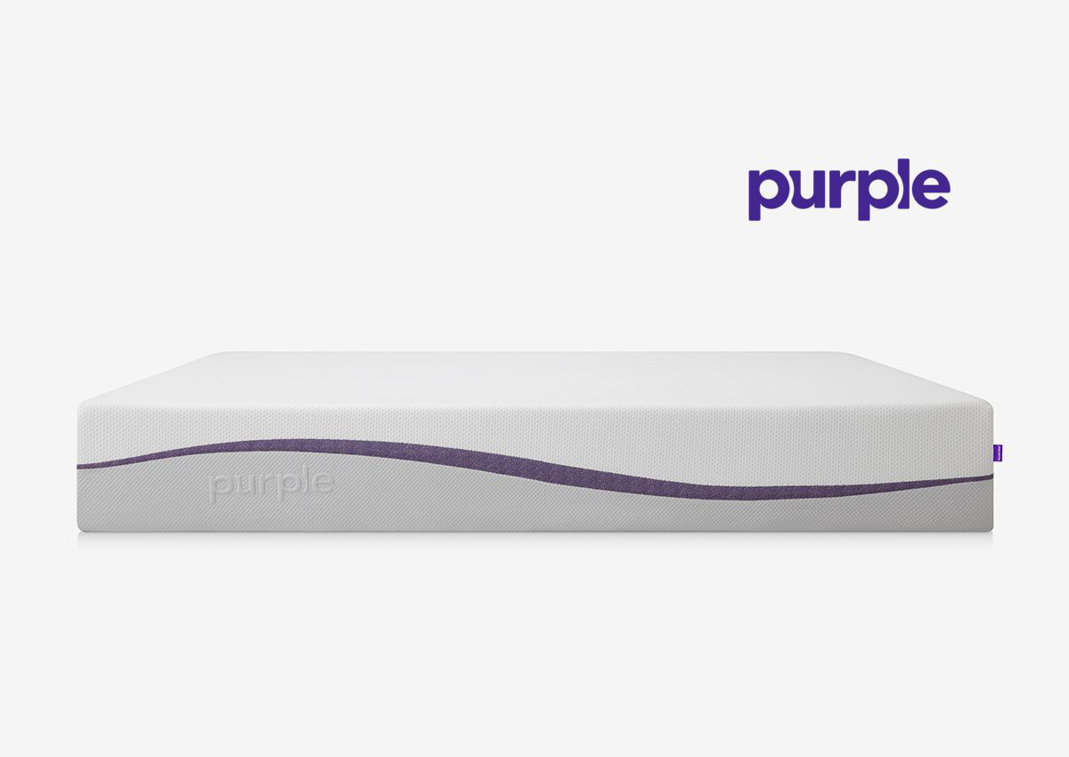 purple mattress roping to one side
