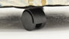 Close Up View of the Casters on the  Multicolored Feather Ottoman by Behold Home | Home Furniture Plus Bedding